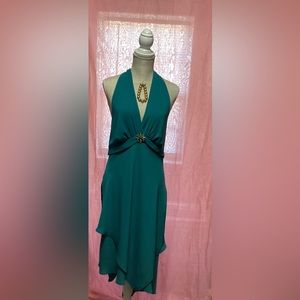 This teal halter dress will make you feel sexy, glamorous and flirty.
